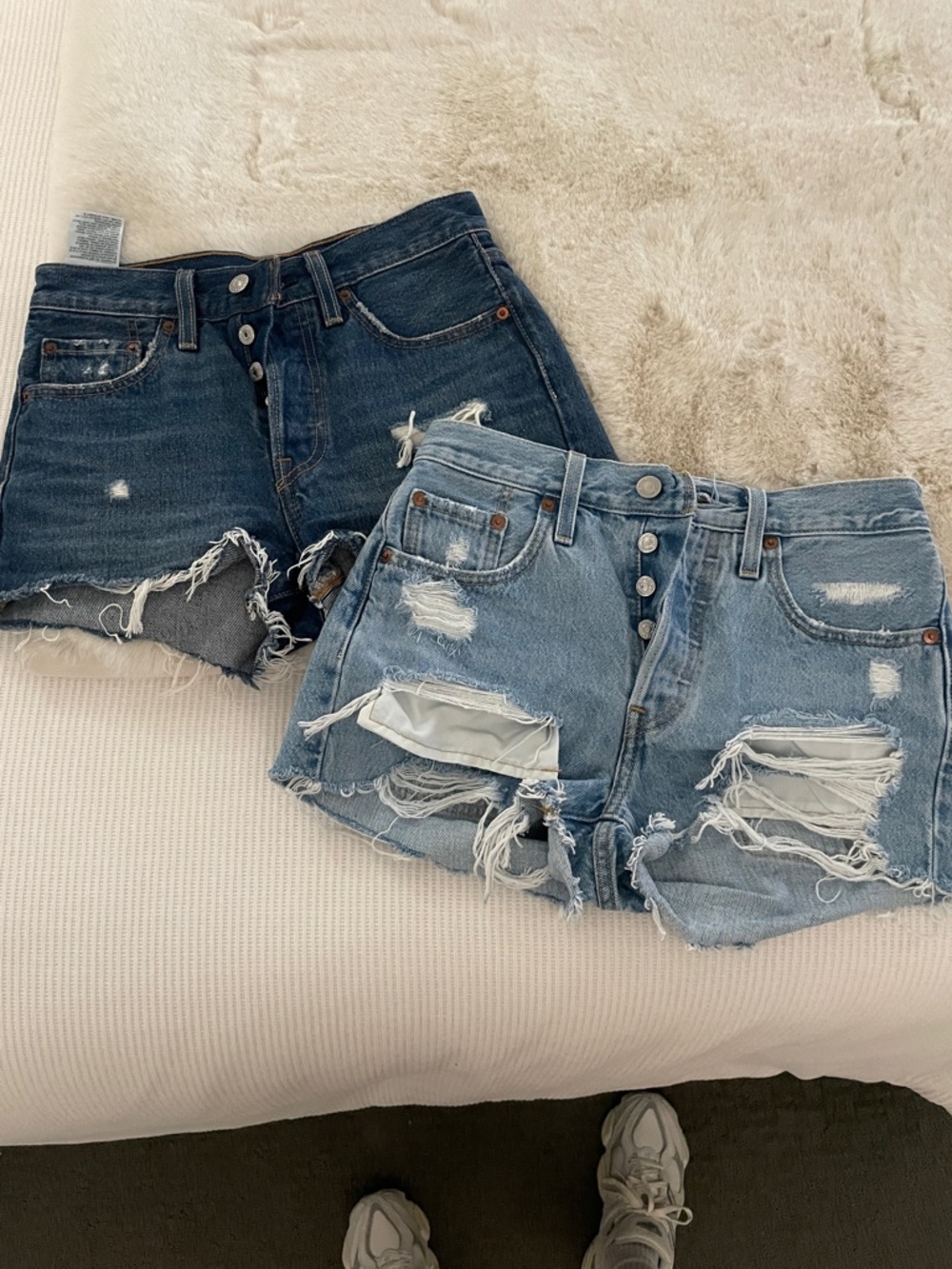 Levi's Ripped Denim Shorts in Light Blue and Dark Blue